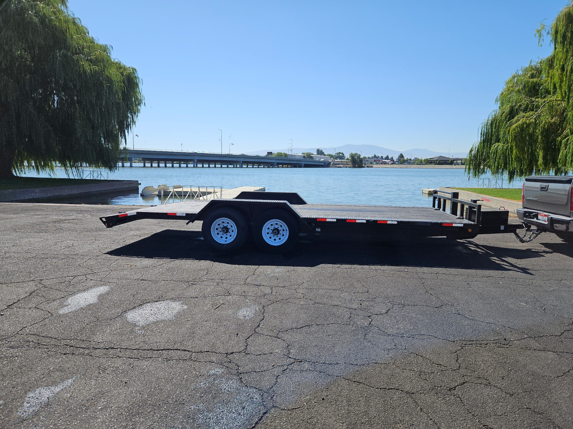 8.5X20 BUBBA EQUIPMENT TRAILER/DIESEL PICKUP HAULER W/ WINCH available for rent from Gem State Haulers