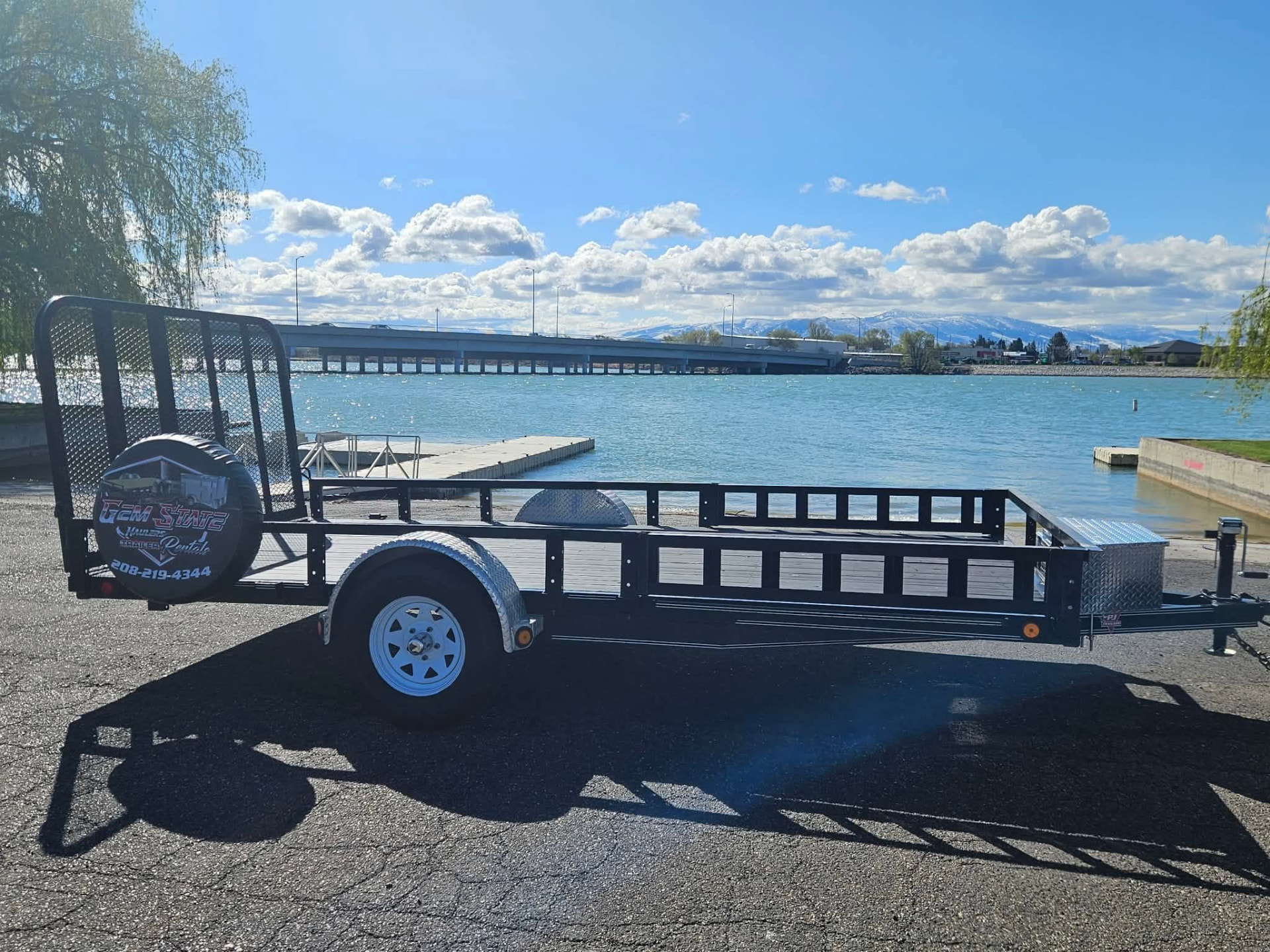 Gem State Haulers utility trailer beside the Snake River