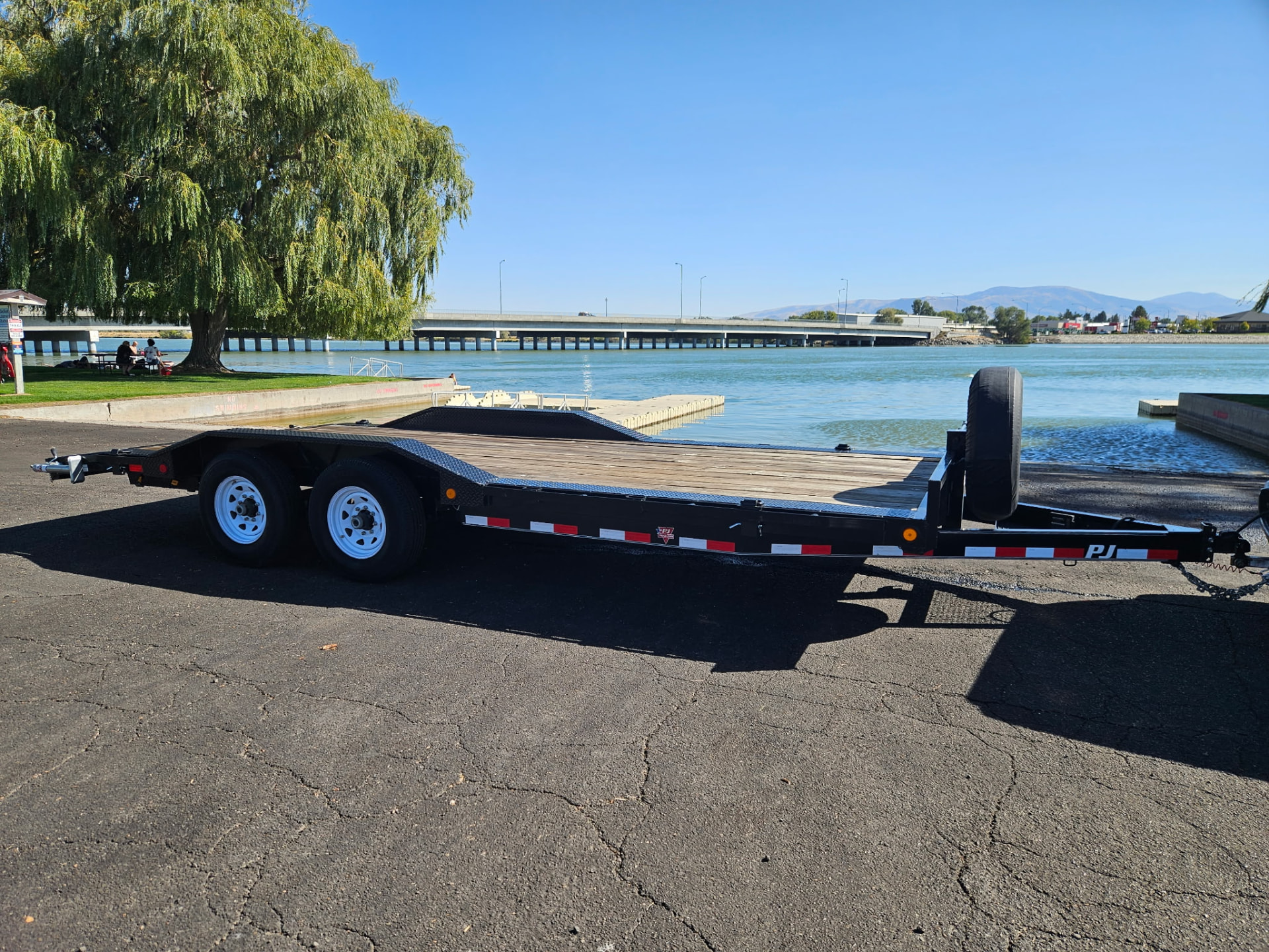 8.5X20 PJ EQUIPMENT TRAILER DIESEL PICKUP HAULER W/WINCH available for rent from Gem State Haulers