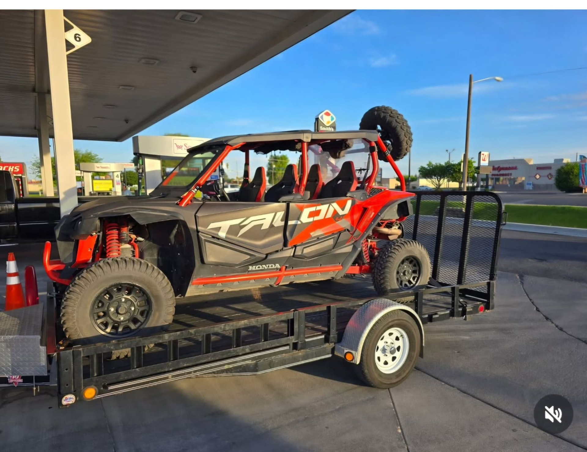 Honda side-by-side loaded on a Gem State Haulers utility trailer